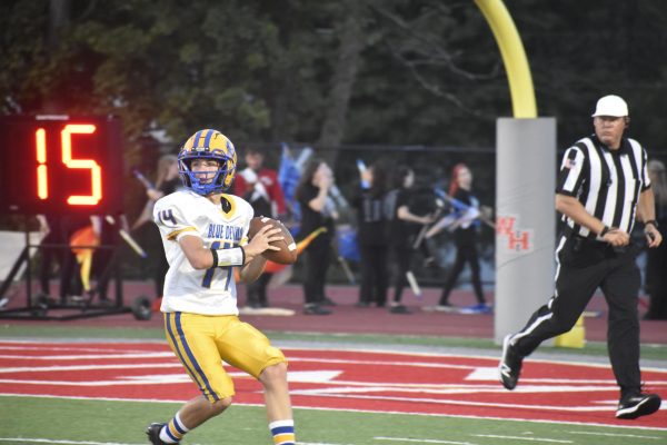 Holden Schreier gets ready to throw a pass. 