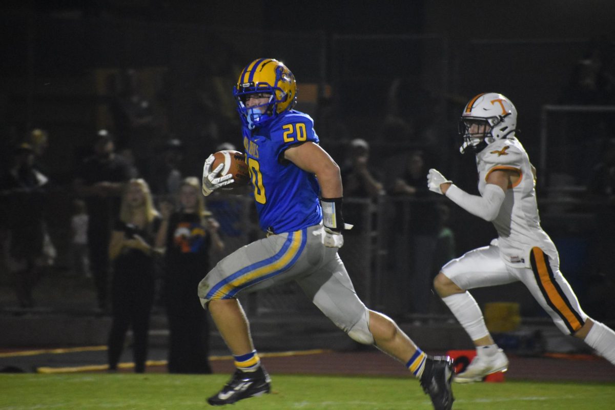 Cayden Pellegrine breaks free on a long pass and run against Tyrone.