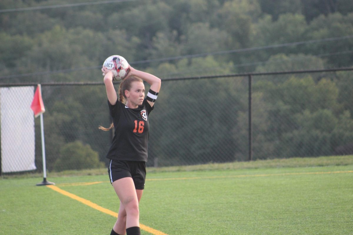 B-A junior Marissa Cacciotti throws in a ball from the side during the Tyrone/Bellwood-Antis soccer team's game against Penns Valley on Monday.