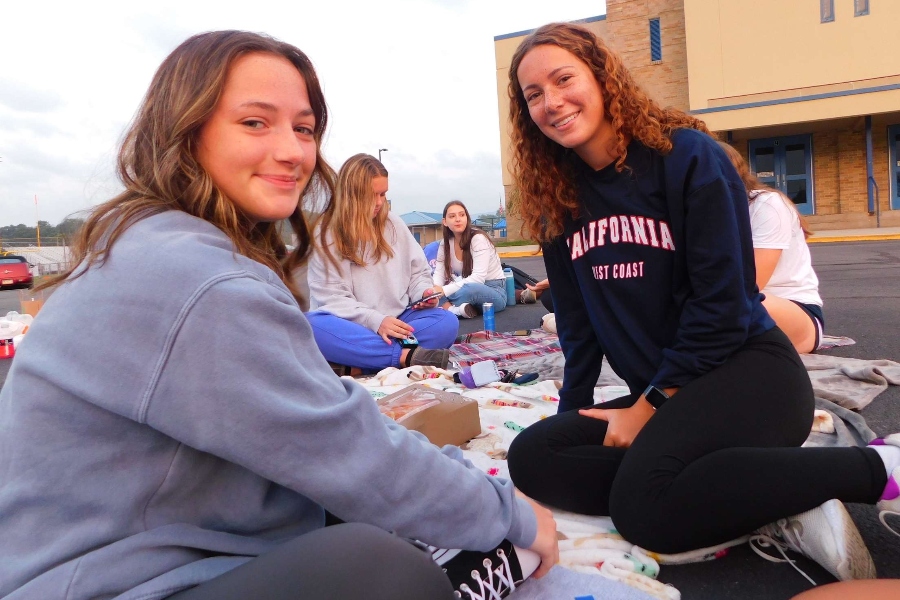 Mackenzie Weber and Riley Andrews bask in the golden sun of another Senior Sunrise at B-A.