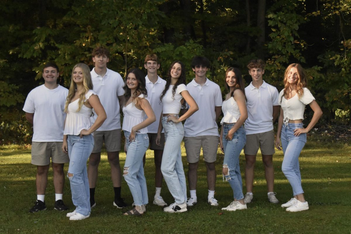 This year's Homecoming Court (left-Gianna Juart, Chloe McCloskey, Avah Hassler, Rowan Kyle, and Briley Campbell- right) with their escorts by their side. 