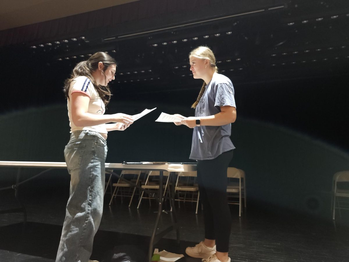 GiGi Juart rehearses with Alia Bennett in the auditorium.