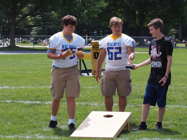 A simple game of cornhole is a fun way to get some exercise and build friendships on National Sports Day.