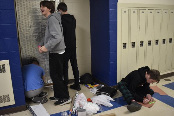 Students will have a chance to perform voluntary service at the school or in the community of B-A's fourth annual Day of Giving next Tuesday. Some of those activities include decorating teachers' classroom doors, like these students in a file photo from 2022.