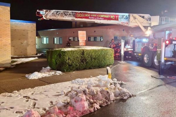 Members of Bellwood's Excelsior Company were on the scene Tuesday morning to battle a fire set in the B-A middle school.