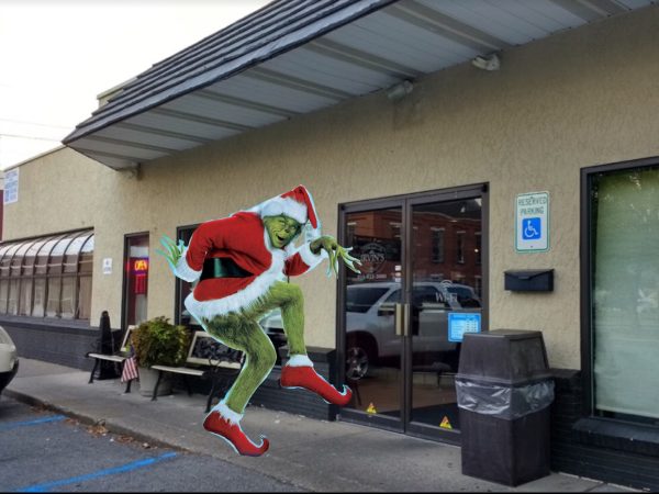 Grinch gets arrested at Irvin’s on Main