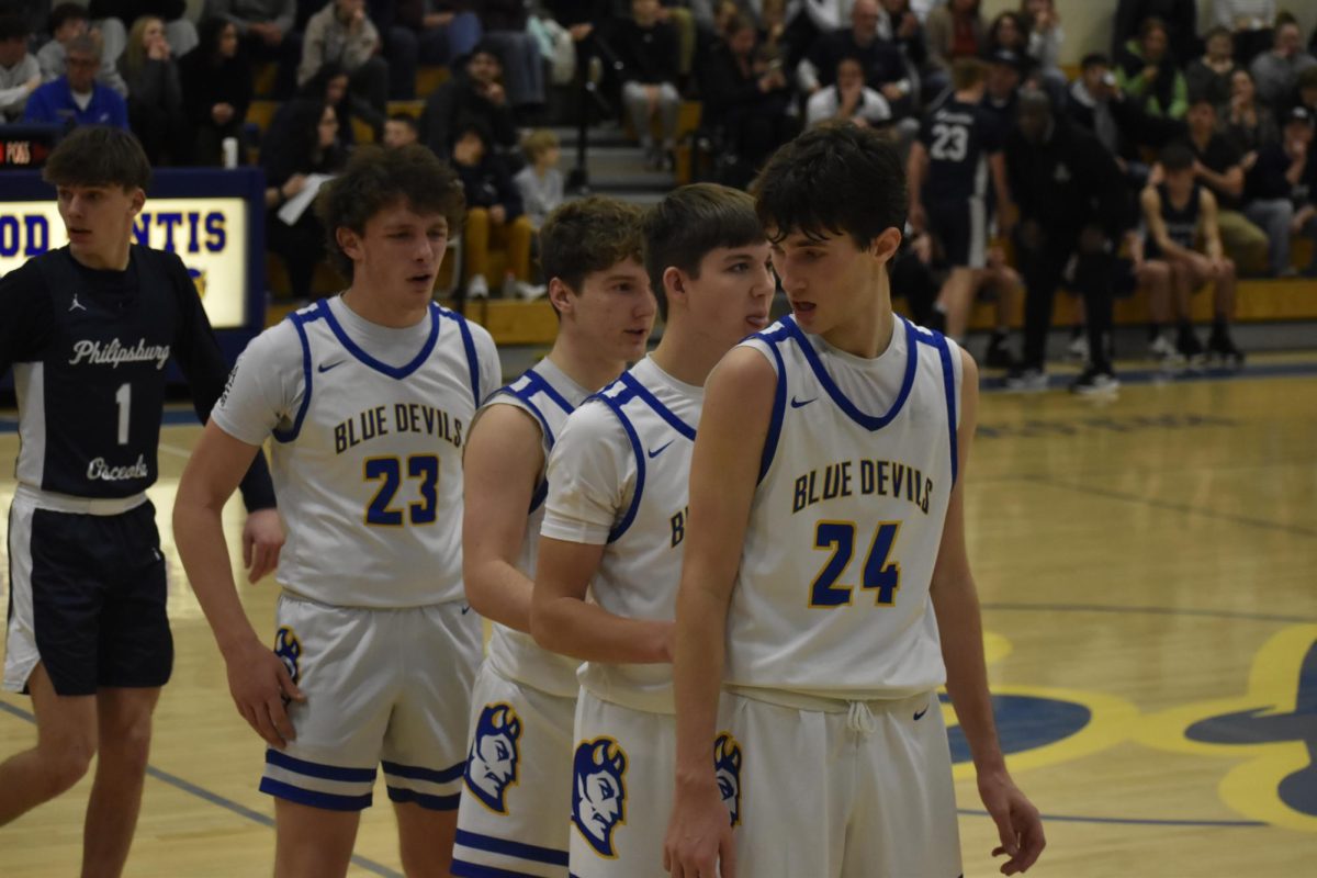 (Back to front) Connor Mayes, Colin Gibbons, Holden Schreier, and Martin Fatzinger stack up for an inbounds play against Philipsburg-Osceola. The boys lost in a close game on Senior Night.