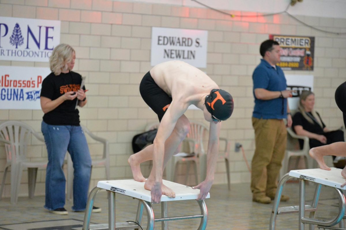 Cameron Gallagher has qualified for Districts for two straight seasons as a member of the co-op swimming team.