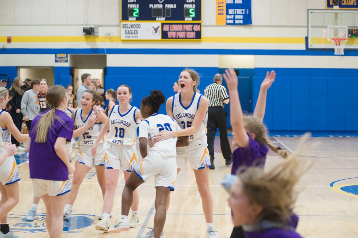 Girls Basketball team in celebration