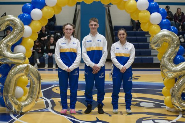 (L to R) Eliana Patterson, and Tanner McElravy, and Juliette Cuevas celebrate their final match at Bellwood