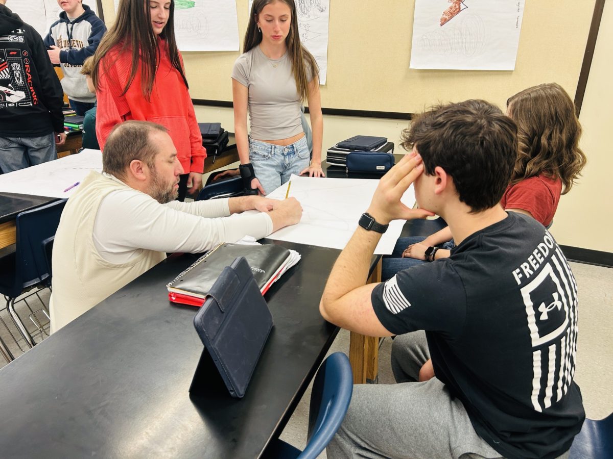 Dr. Martin teaching his students 
