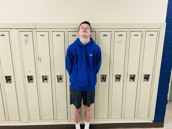 Cherry standing in hallway 