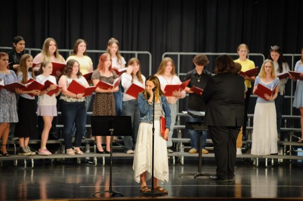 Eighth grader Cameron Hofer finishes her solo at the annual spring concert.